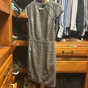 Short sleeved, mid-length gray checked dress
